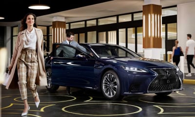 Lady walking away from Lexus LS Valet parking